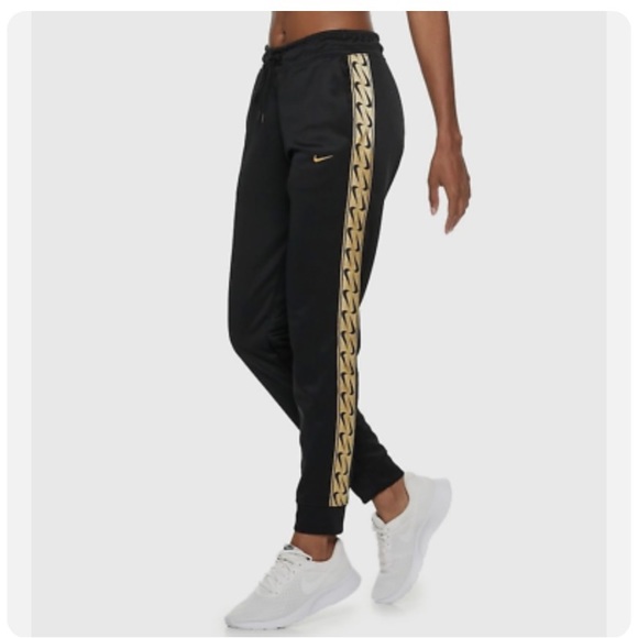 Nike Pants - Nike women’s sweatpants joggers black with gold metallic stripe size medium EUC